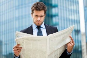 Man reading a newspaper