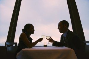 Couple toasting glasses.