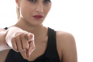 Model Released. Young Woman Pointing