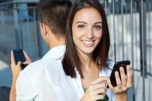 young couple with smart phone