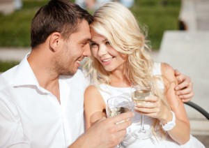 couple drinking wine in cafe