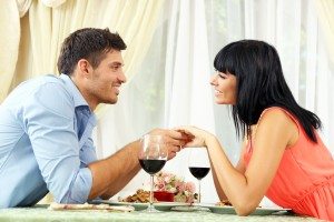 Beautiful couple having  romantic dinner at restaurant