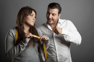The girl showing to her boyfriend his sex length