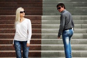 Young fashionable couple on the steps