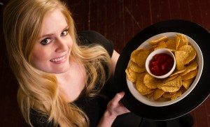 Young Attractive Female Server Brings Appetizer Chips Salsa Food