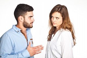 Young mixed-race couple having ralationship problems isolated on