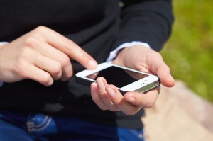 woman's hands with mobile phone