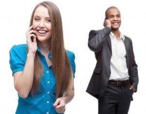 happy smiling business people calling by mobile telephone