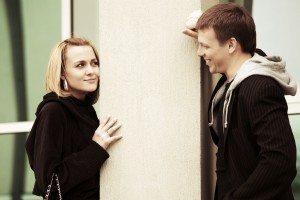 Happy young couple in love on the city street