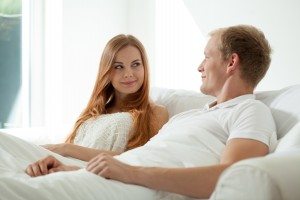 Couple during morning in bed