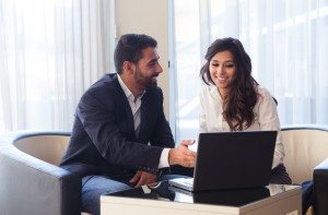 Business couple with computer