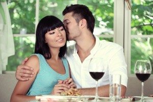 Beautiful young couple at restaurant