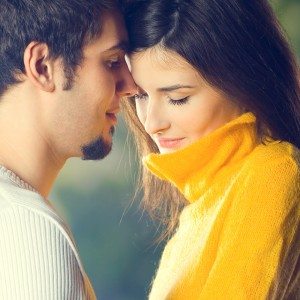 Portrait of young attractive couple, outdoors