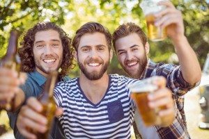 Hipster friends having a beer together