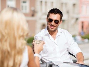 couple drinking wine in cafe