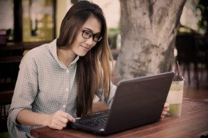 Young woman using laptop