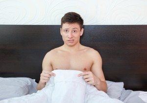 Impotent man worrying about his penis and erection failure