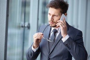 Handsome businessman on the phone