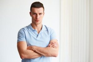 Young businessman standing in an office