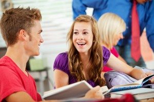 High School: Girl Student Laughs With Friend