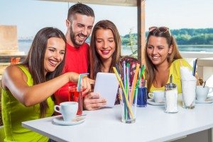 Friends enjoy on holiday in the cafe.