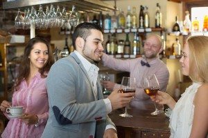 Couple drinking wine at bar